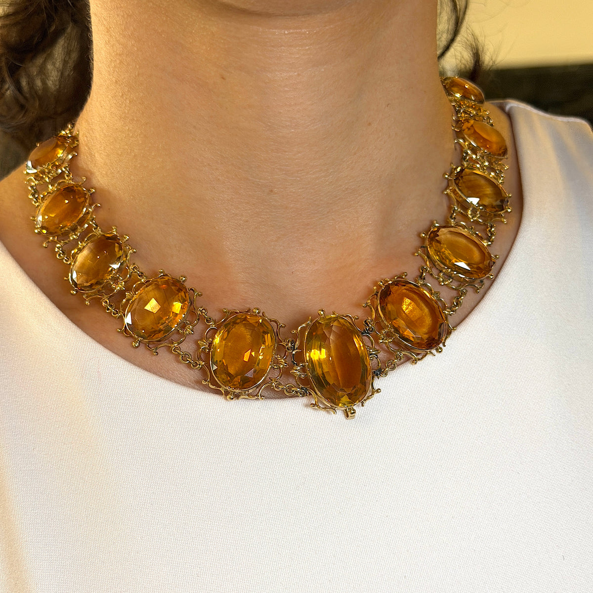 Antique Georgian Victorian Natural Oval Cut Citrine Necklace in 14K & 22K Yellow Gold with leaf and scroll motifs, on model.