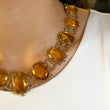 Antique Georgian Victorian Natural Oval Cut Citrine Necklace in 14K & 22K Yellow Gold with leaf and scroll motifs, on model.
