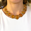Antique Georgian Victorian Natural Oval Cut Citrine Necklace in 14K & 22K Yellow Gold with leaf and scroll motifs, on model.