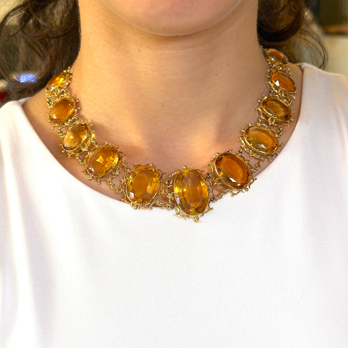 Antique Georgian Victorian Natural Oval Cut Citrine Necklace in 14K & 22K Yellow Gold with leaf and scroll motifs, on model.