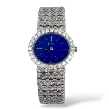Piaget Vintage Lapis Lazuli Dial Hadstone Dial 27 x 24 mm 18K White Gold Diamond Bezel Circa 1976