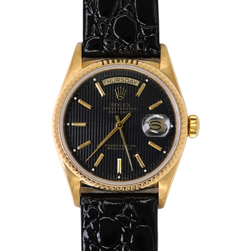 Rolex Day-Date 36 Black Tapestry Dial Fluted Bezel 18K Yellow Gold Leather Band REF 18038 Black Tapestry Dial Serviced Year 1987