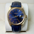Rolex Oyster Perpetual Date 34mm 14K Yellow Gold Blue Dial Fluted Bezel Leather Band Ref. 1503 Year 1979