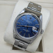 Rolex Oyster Perpetual Date 34mm Blue Mosaic Dial Smooth Bezel Stainless Steel REF. 1500 Blue Mosaic Dial Year 1971 Riveted Bracelet