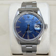 Rolex Oyster Perpetual Date 34mm Blue Mosaic Dial Smooth Bezel Stainless Steel REF. 1500 Blue Mosaic Dial Year 1971 Riveted Bracelet