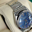 Rolex Oyster Perpetual Date 34mm Blue Mosaic Dial Smooth Bezel Stainless Steel REF. 1500 Blue Mosaic Dial Year 1971 Riveted Bracelet