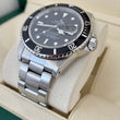 Rolex Submariner Date 40 Steel Automatic Black Dial Black Bezel Oyster Bracelet REF 16800 Year 1984 Rolex Service Papers