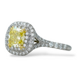 Tiffany and Co Soleste diamond and platinum ring with a 0.78 ct Fancy Intense yellow cushion cut diamond, side view.