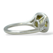 Tiffany and Co Soleste diamond and platinum ring with a 0.78 ct Fancy Intense yellow cushion cut diamond, side view.