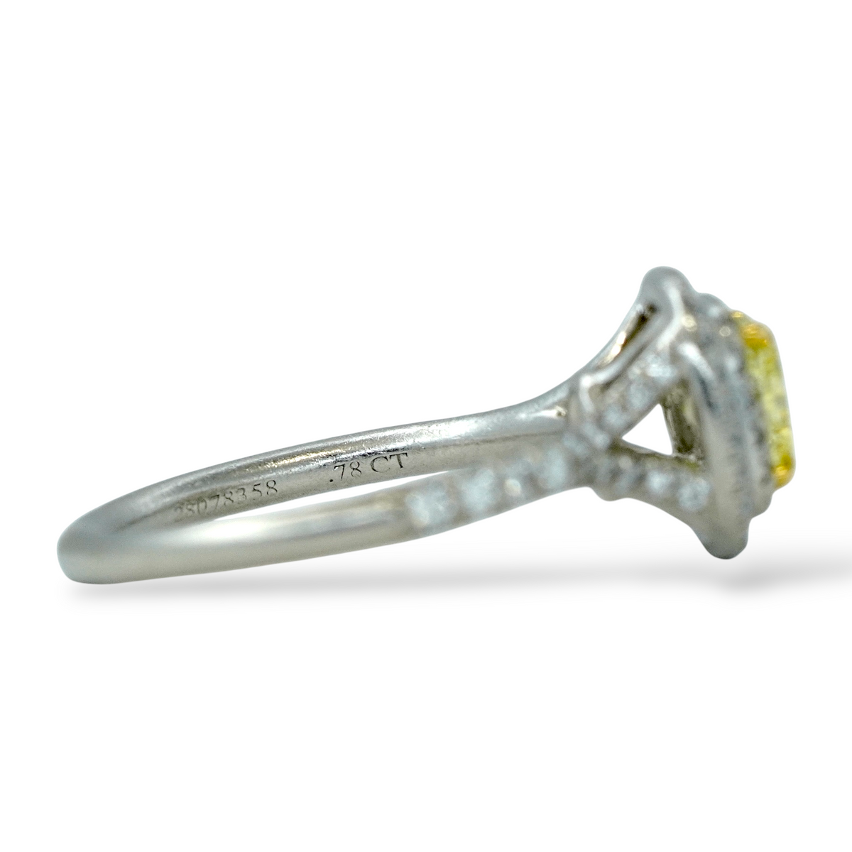 Tiffany and Co Soleste diamond and platinum ring with a 0.78 ct Fancy Intense yellow cushion cut diamond, side view.