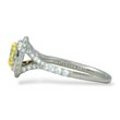 Tiffany and Co Soleste diamond and platinum ring with a 0.78 ct Fancy Intense yellow cushion cut diamond, side view, close up of signature.