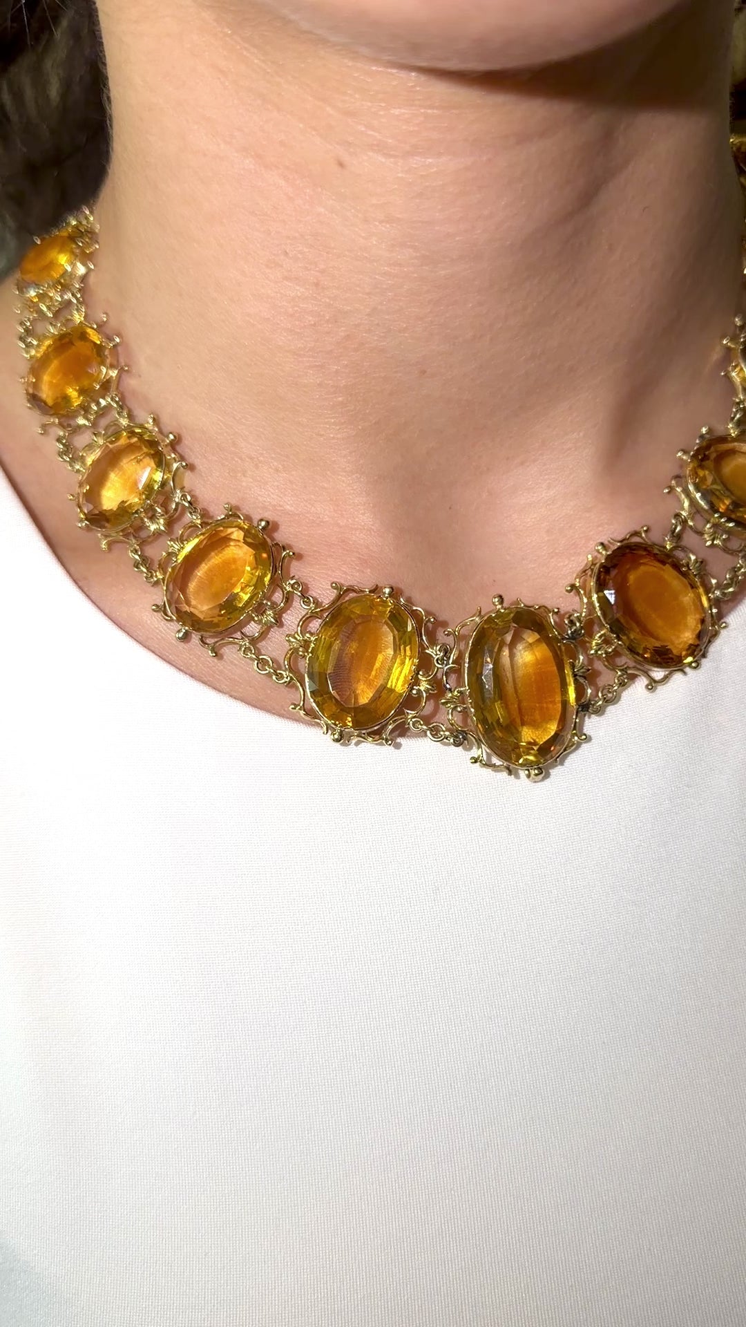 Antique Georgian Victorian Natural Oval Cut Citrine Necklace in 14K & 22K Yellow Gold with leaf and scroll motifs, on model.