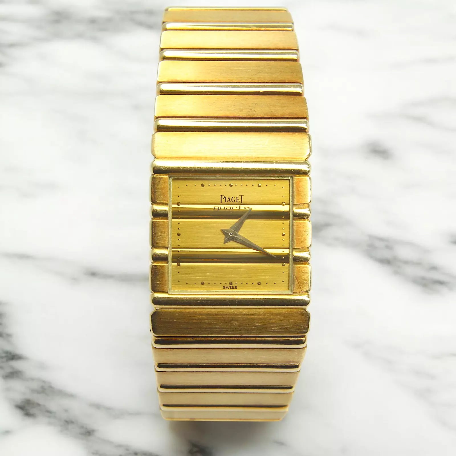 Piaget Polo Men's 25mm Gold Dial Patina 18K Yellow Gold Quartz Movement 7131C701 